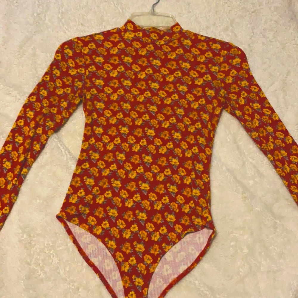 Body suit red base with yellow flowers